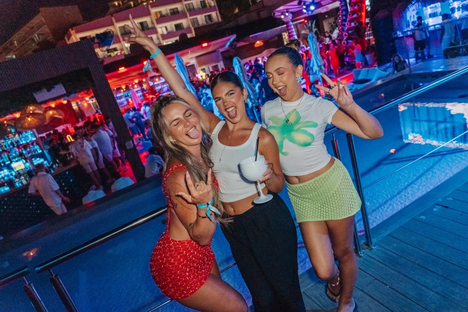 Girls posing together at Full Moon Party in Magaluf