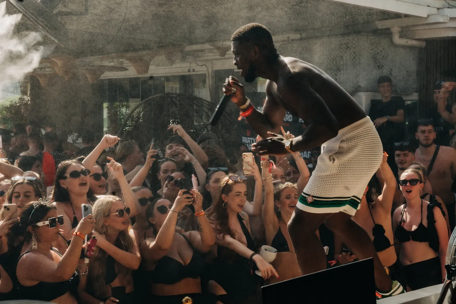 Artist performing on stage at Agenda Beach Club Party in Magaluf