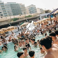 Crowd partying around the pool at MedAsia Beach Club in Malta
