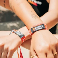 Party Hard Travel discount wristbands worn by guests