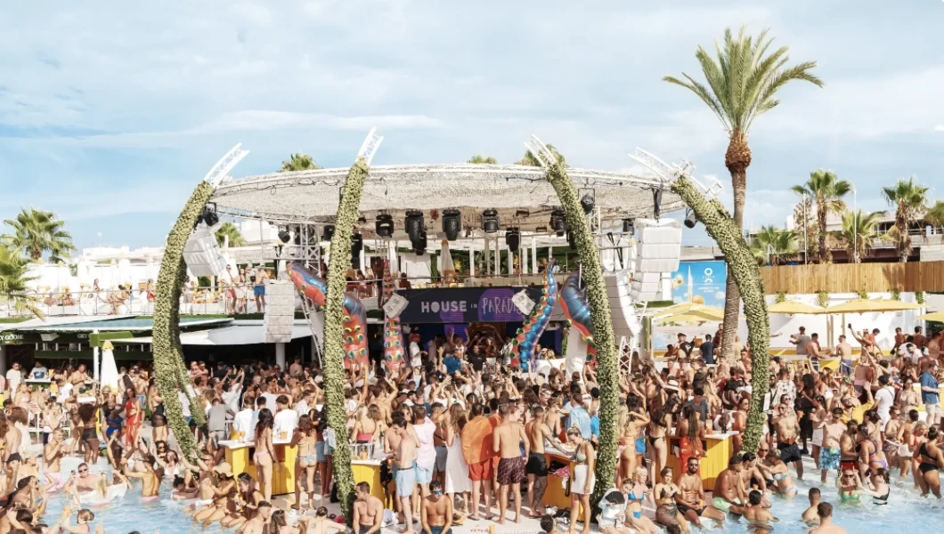 O beach Ibiza Crowd View people dancing and partying in the pool and by the DJ