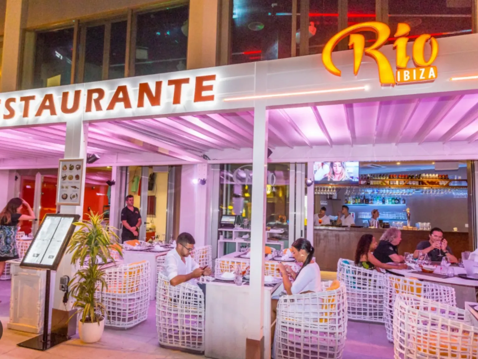 Rio Bar Ibiza Street view couples eating and drinking
