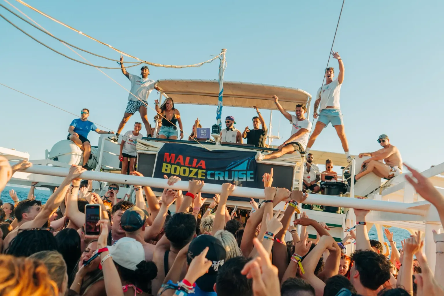 Party crowd on board the Malia Booze Cruise