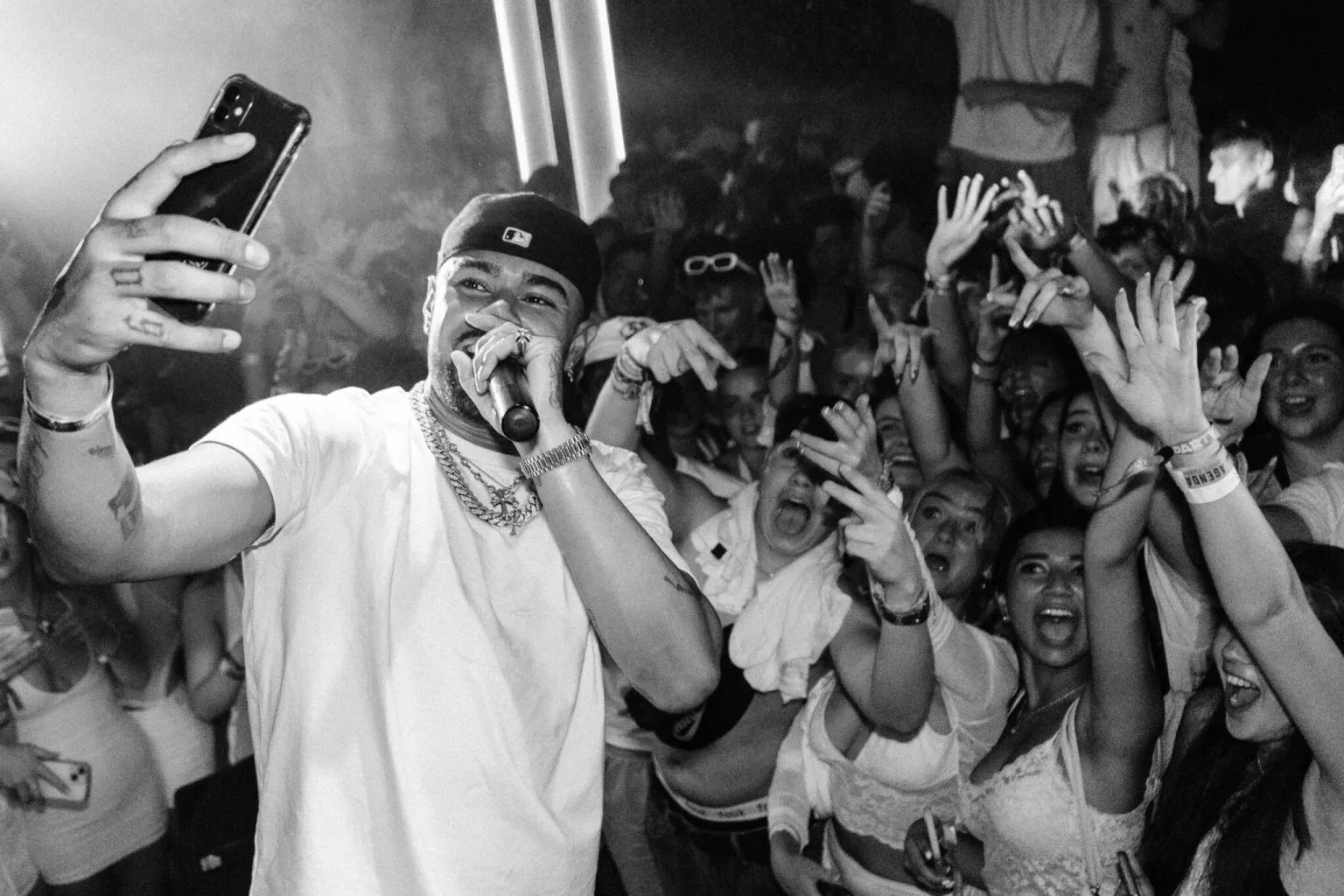 Wes Nelson performing and taking a photo at Agenda White Party in Kavos